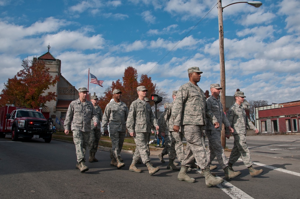 179th Airlift Wing and 200th RED HORSE members march in Veterans Day Parade