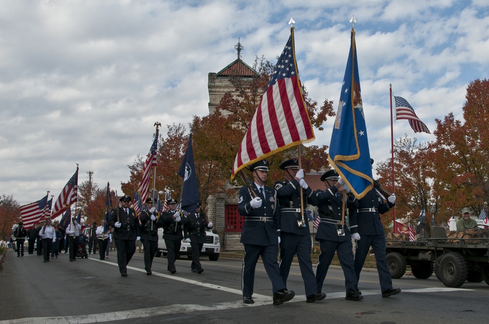 179th Airlift Wing and 200th RED HORSE members march in Veterans Day Parade