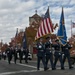 179th Airlift Wing and 200th RED HORSE members march in Veterans Day Parade