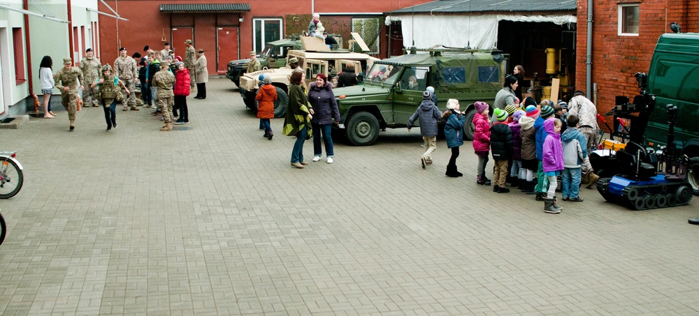 Everyone is doing something, a community relations event in Latvia
