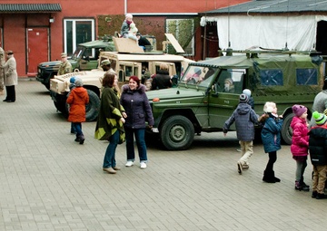 Everyone is doing something, a community relations event in Latvia