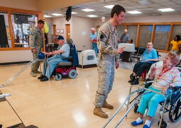 Soldiers and Airmen visit veterans
