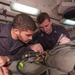 USS Carl Vinson Sailors conduct parachute maintenance