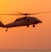 MH-60S Seahawk flies near USS Carl Vinson