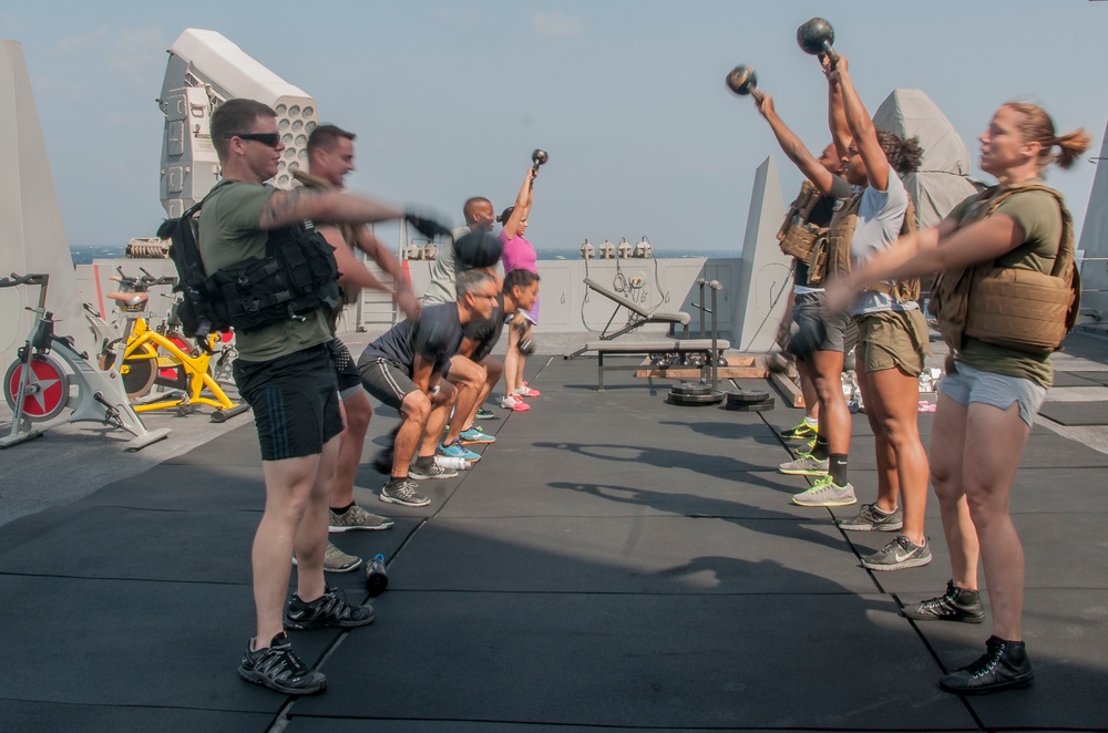 USS San Diego Sailors and Marines participate in a HERO workout to honor veterans