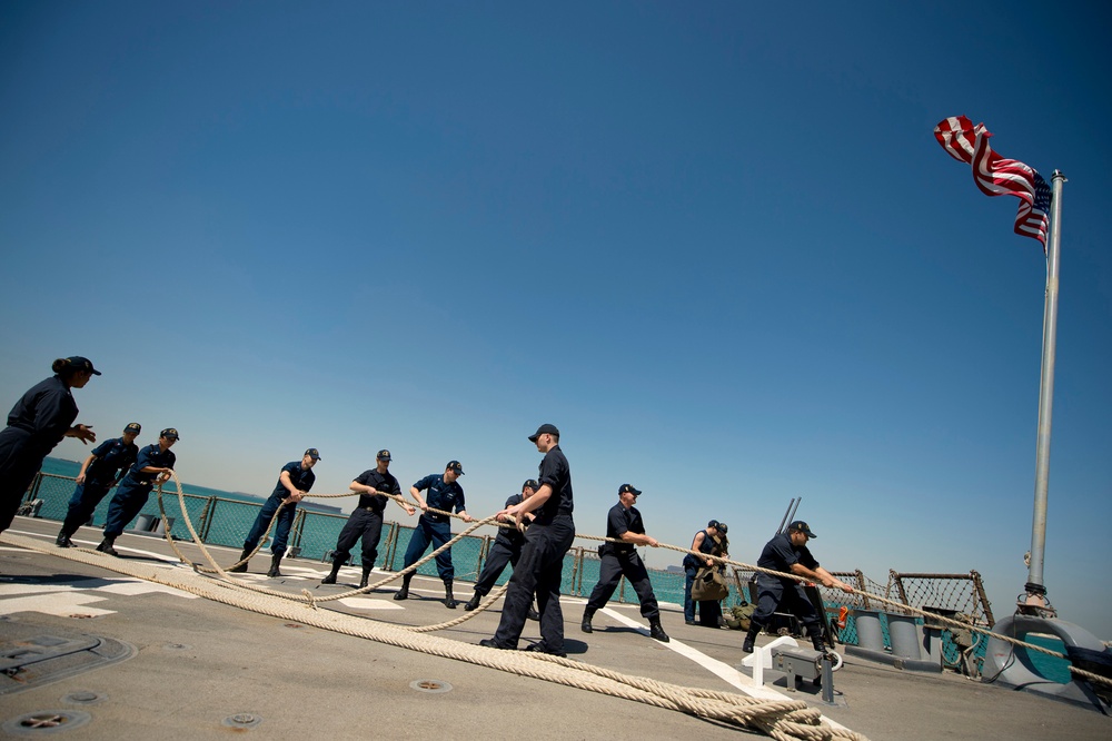USS Arleigh Burke prepares to depart Bahrain