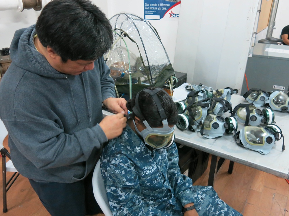 Custom-fit 'Chem Gear' protects forward-deployed Sailors