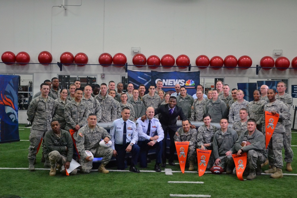'Broncos Huddle' Soldiers, Airmen attend show