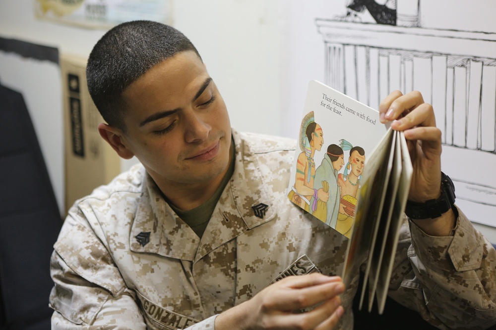 USS Comstock Marines reach back home through reading
