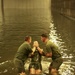Marines and sailors get baptised aboard the USS Makin Island
