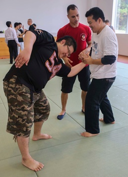 “Take ‘em to the deck!”: Marines teach Okinawan students MCMAP