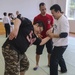 “Take ‘em to the deck!”: Marines teach Okinawan students MCMAP