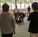 “Take ‘em to the deck!”: Marines teach Okinawan students MCMAP