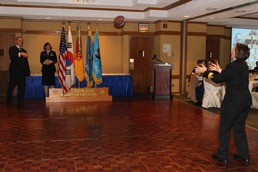 Navy senior officer catches football