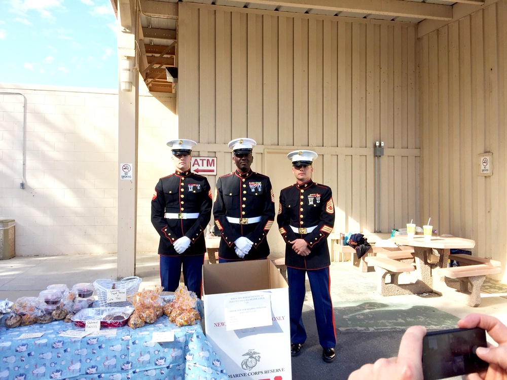 Active Duty Marines bring Toys for Tots to the High Desert
