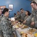 Airmen residing in dorms receive Thanksgiving meal