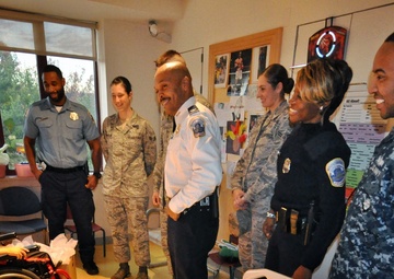 Navy, Air Force, Police Task Force delivers Thanksgiving Day happiness to Washington's underprivileged