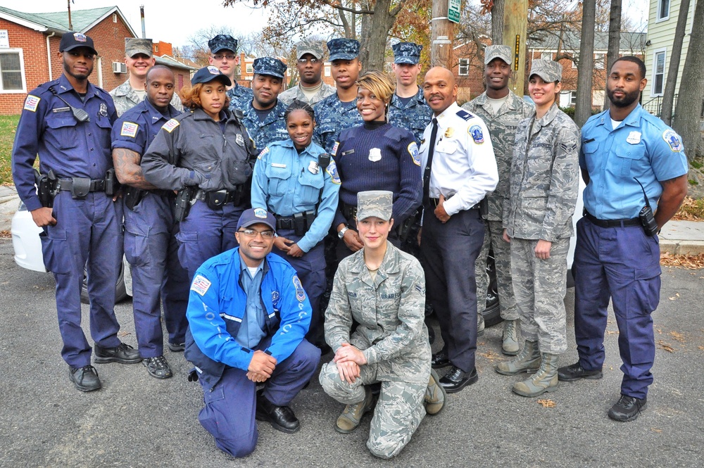 Joint Base teams with police to help needy families