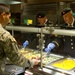 7th Special Forces Group (Airborne) Soldiers enjoy Thanksgiving meal