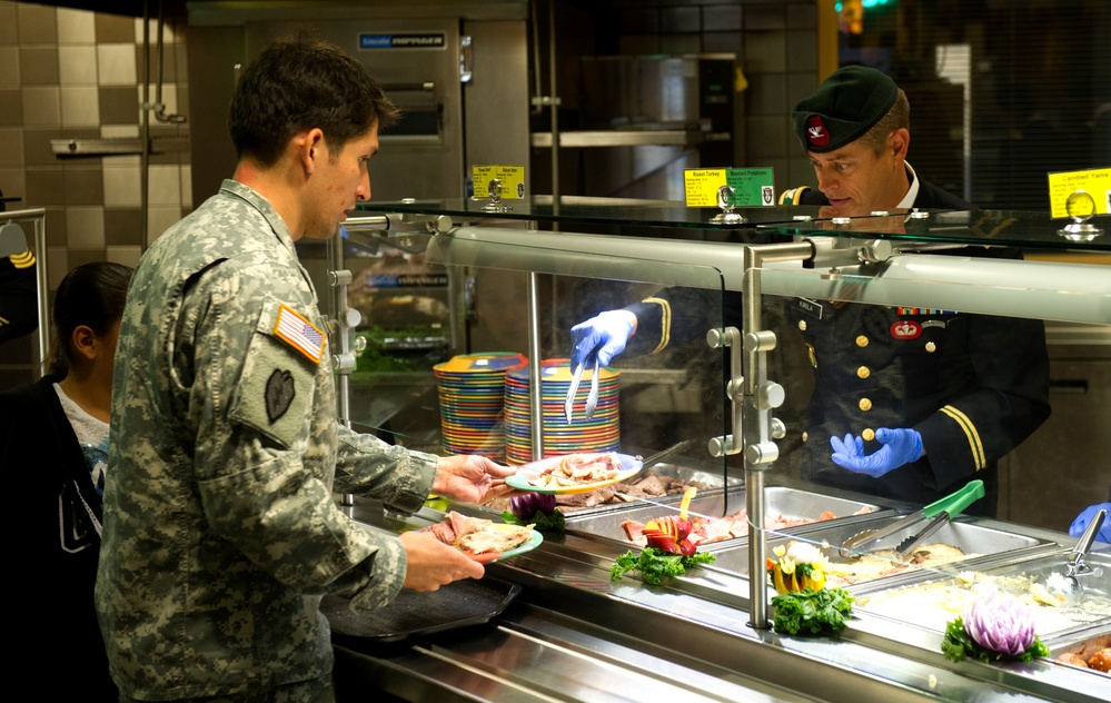 7th Special Forces Group (Airborne) Soldiers enjoy Thanksgiving meal