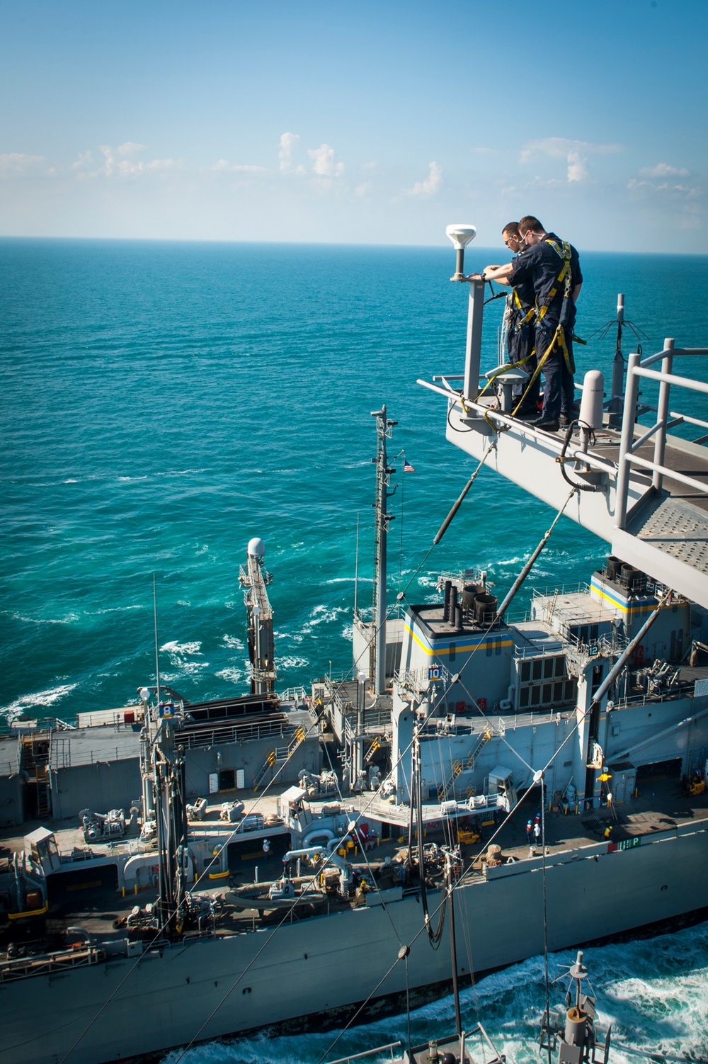 USS Carl Vinson Sailors conduct maintenance on an anemometer