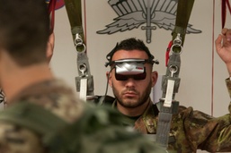 Soldiers prepare foreign jumpmasters for Operation Toy Drop