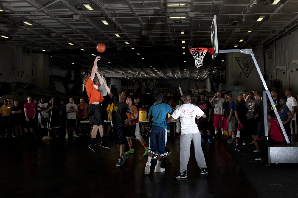 USS Nimitz Sailors play basketball