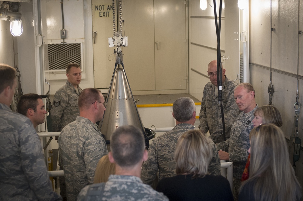 Gen. Martin E. Dempsey observes a demonstration of the transporters used for LGM-30G Minuteman III intercontinental ballistic missiles