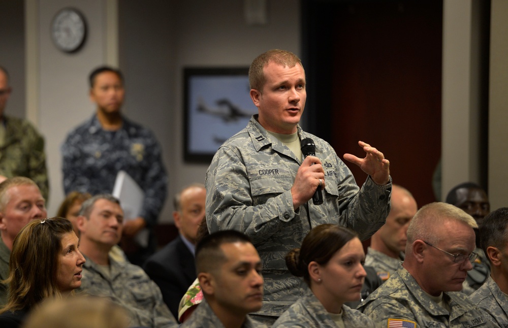 Officer asks defense secretary a question