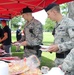 Airmen get their fill of warm weather, comfort food during BBQ
