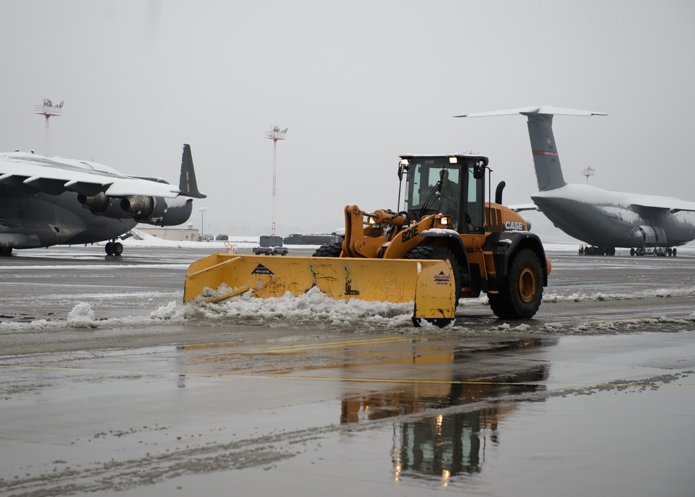 Airmen plow through first snowfall