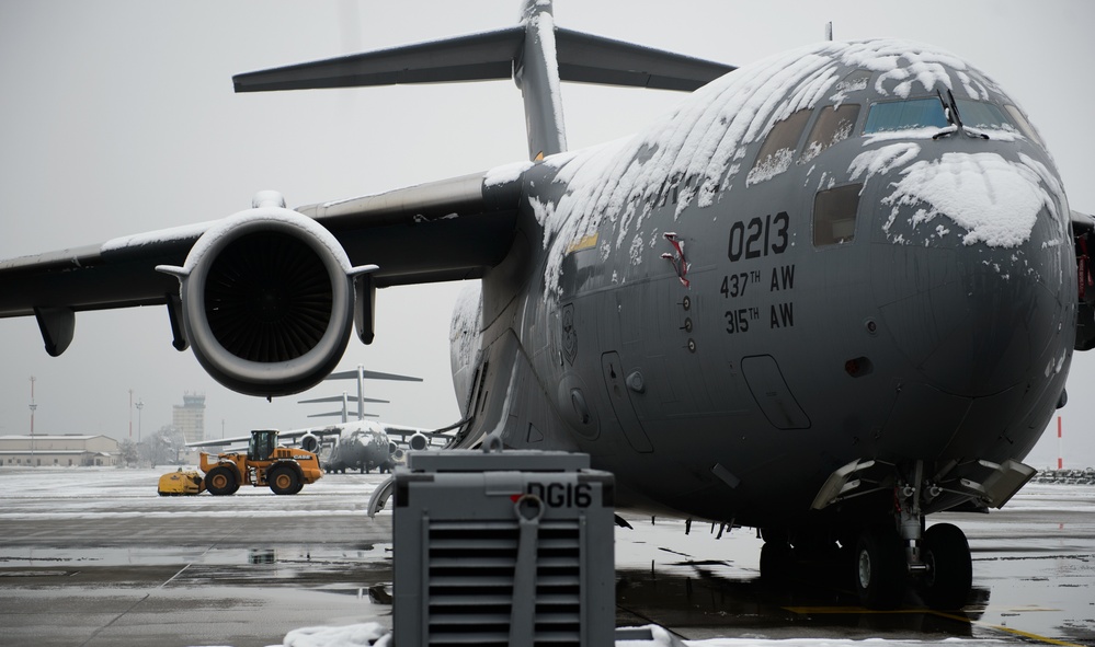 Airmen plow through first snowfall