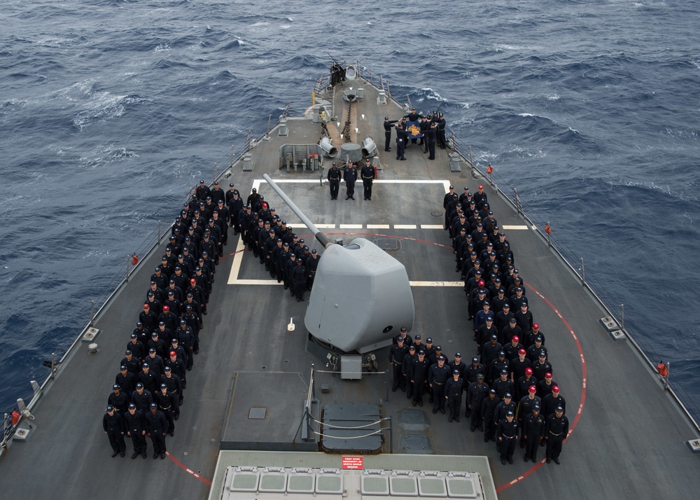 USS Donald Cook Sailors take photo for Army-Navy college football game