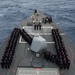 USS Donald Cook Sailors take photo for Army-Navy college football game