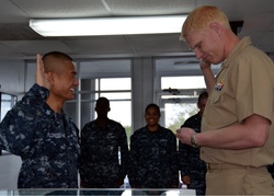 NAS Kingsville reenlists Sailor