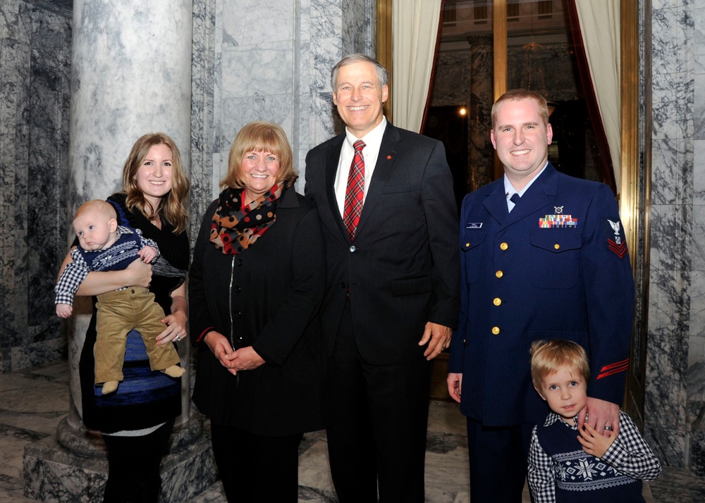 Coast Guard surfman honored by Washington State governor at tree lighting ceremony