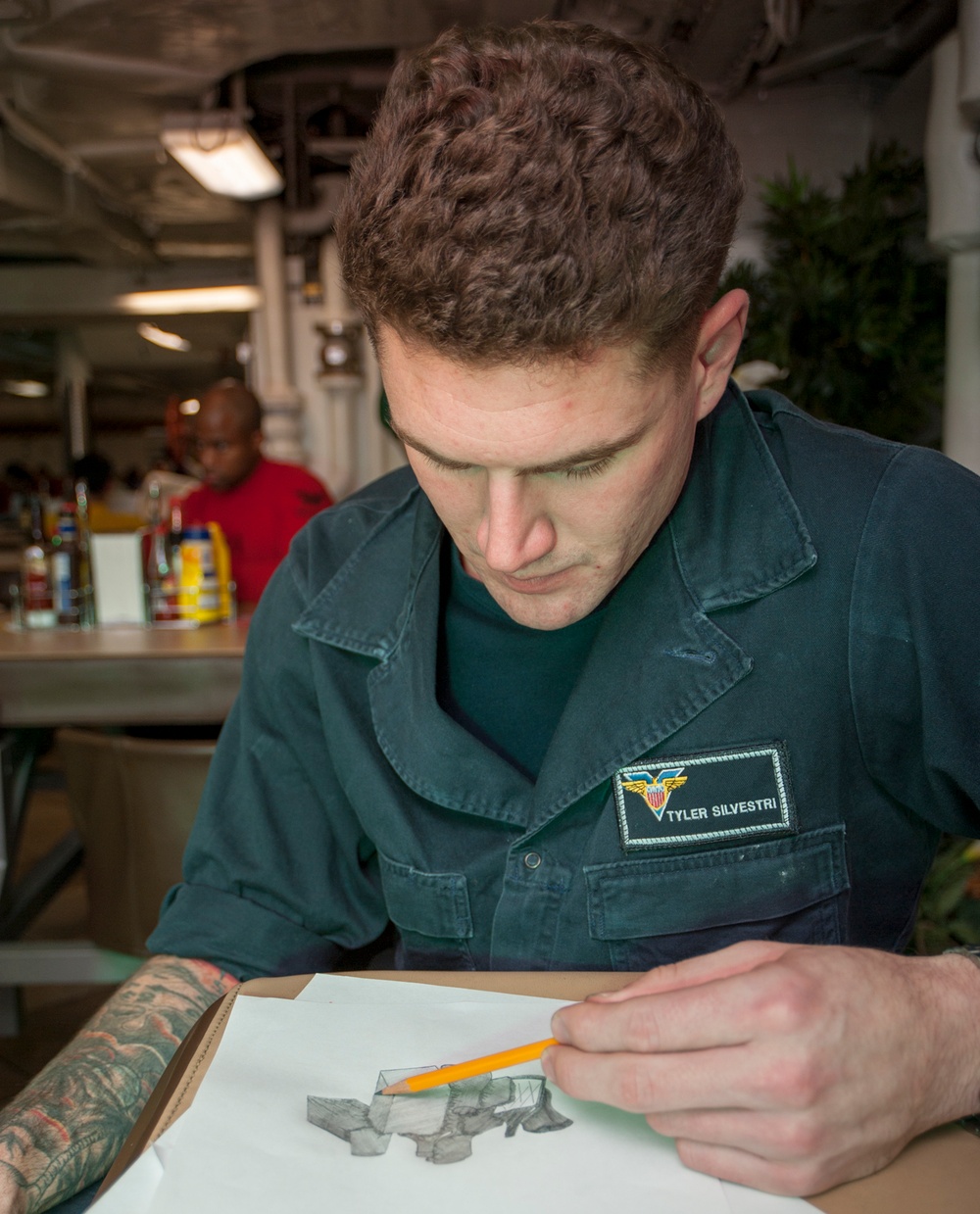 USS Carl Vinson Sailors take part in visual arts class