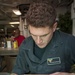 USS Carl Vinson Sailors take part in visual arts class