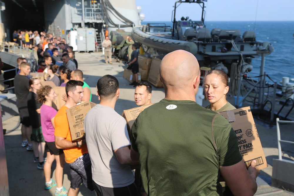 Replenishment-at-sea boosts USS Comstock's supplies
