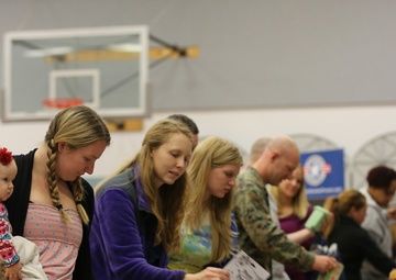 Combat Center families participate in OHF toy giveaway