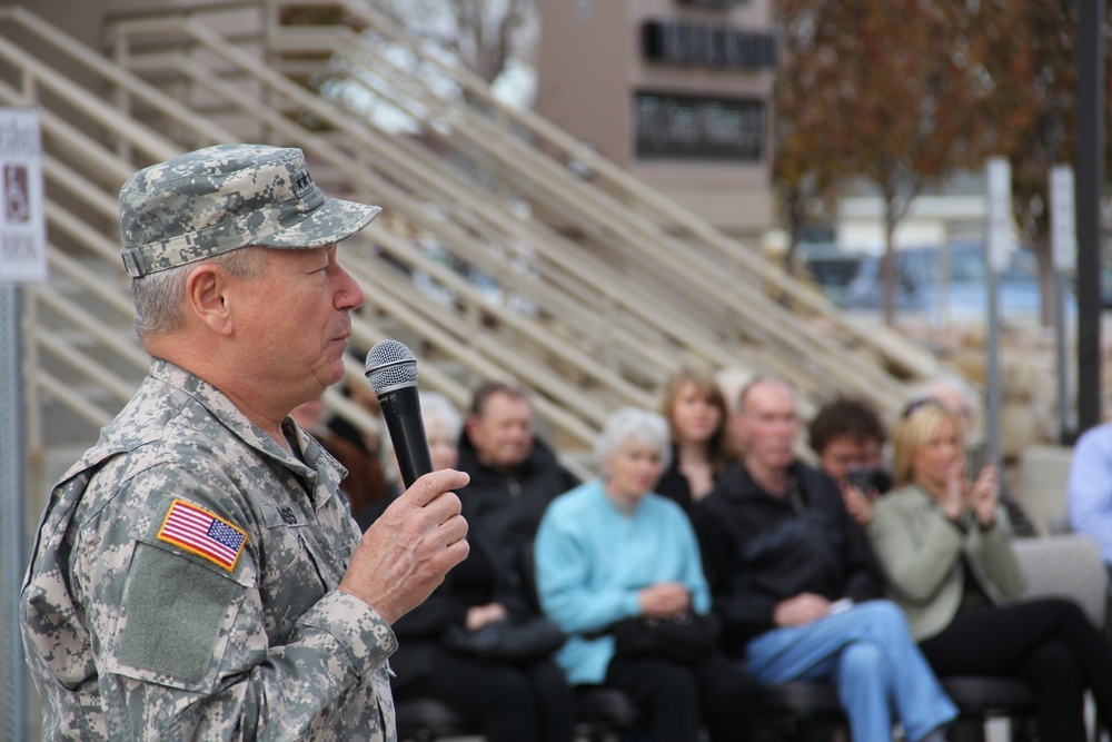 Gen. Grass presents Soldiers Medal to Staff Sgt. Robert Kelley for heroism at Camp Williams Dec. 6, 2014