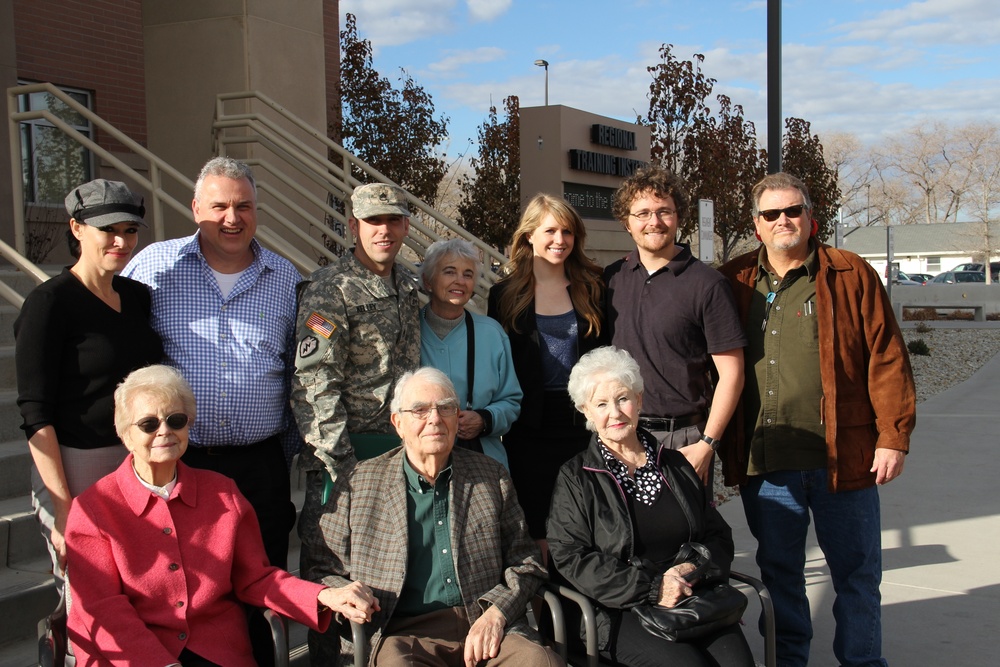 Gen. Grass presents Soldiers Medal to Staff Sgt. Robert Kelley for heroism at Camp Williams Dec. 6, 2014