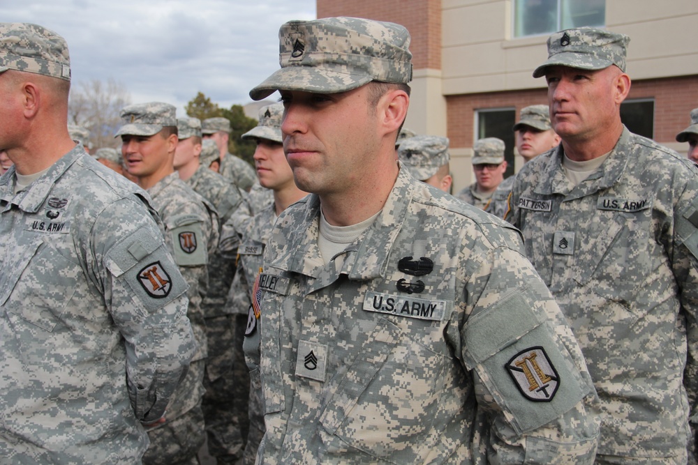 Gen. Grass presents Soldiers Medal to Staff Sgt. Robert Kelley for heroism at Camp Williams Dec. 6, 2014