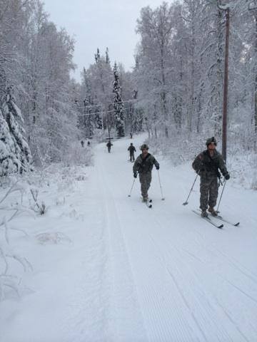 Soldiers cross-country skiing