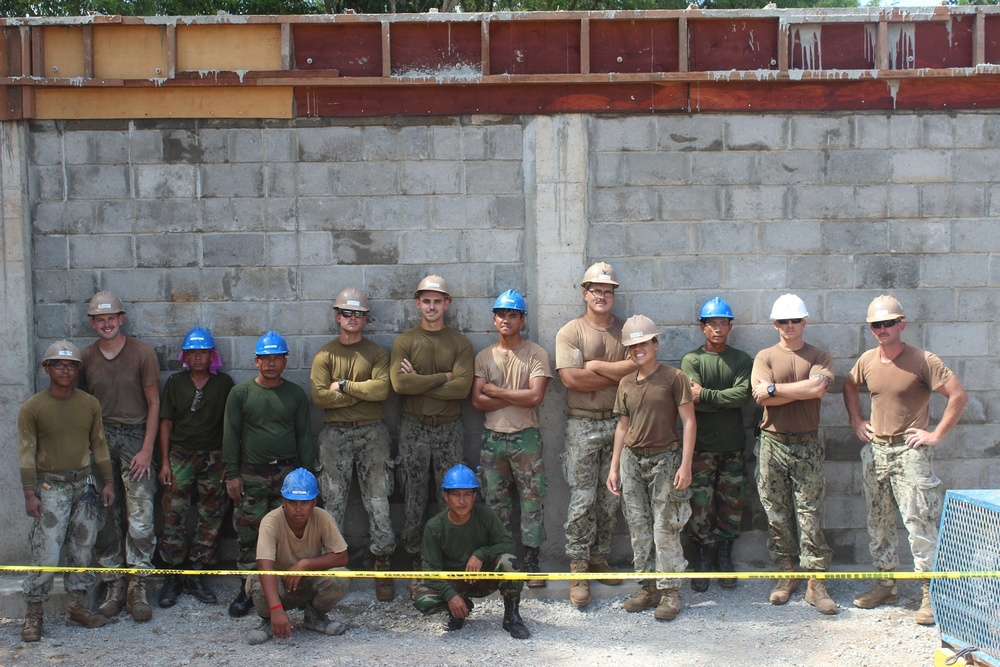 NMCB 4 and RCAF work together to accomplish construction projects