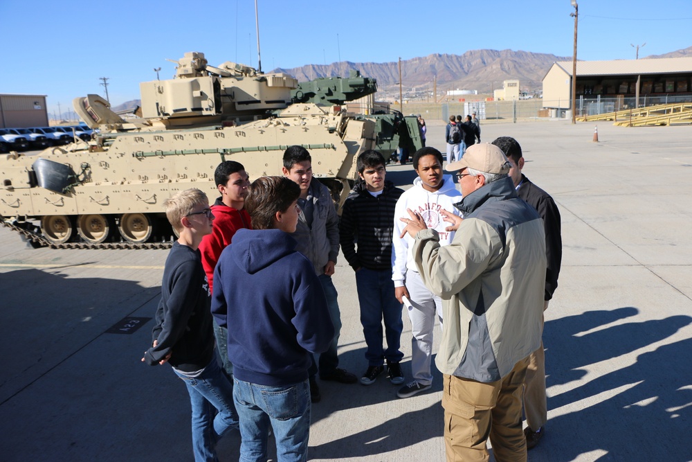 Soldiers and engineers emphasize to students the importance of science and technology that goes into modernizing the Army