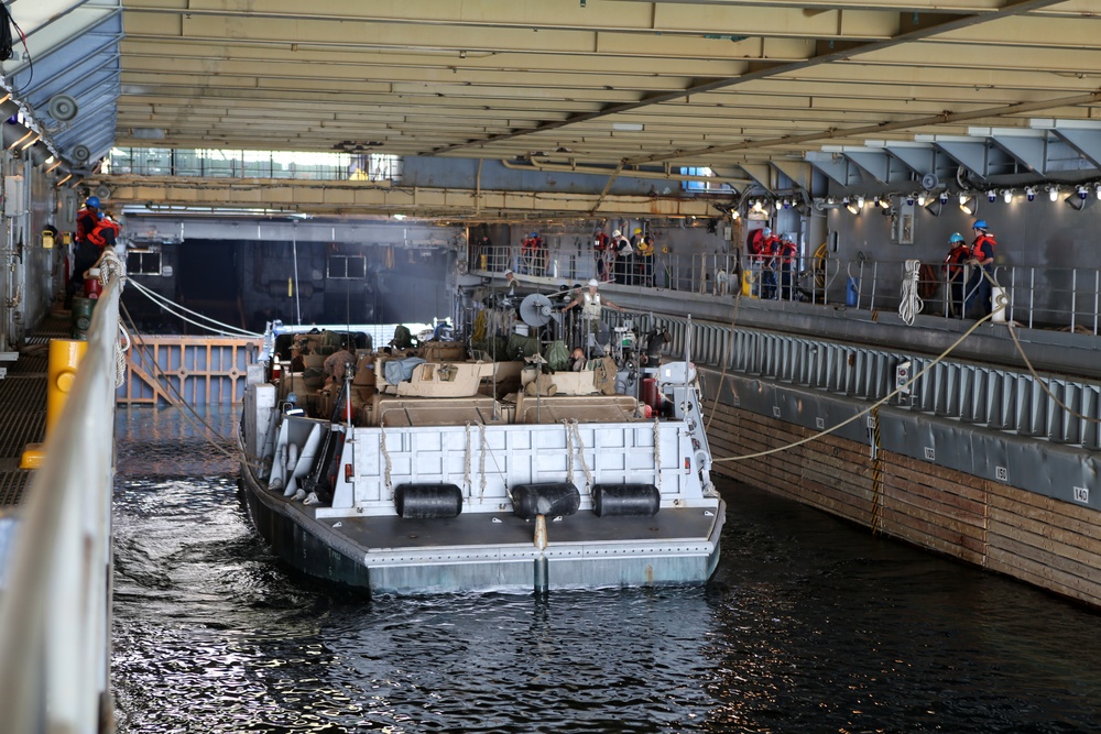 LCU's take troops ashore from USS Comstock