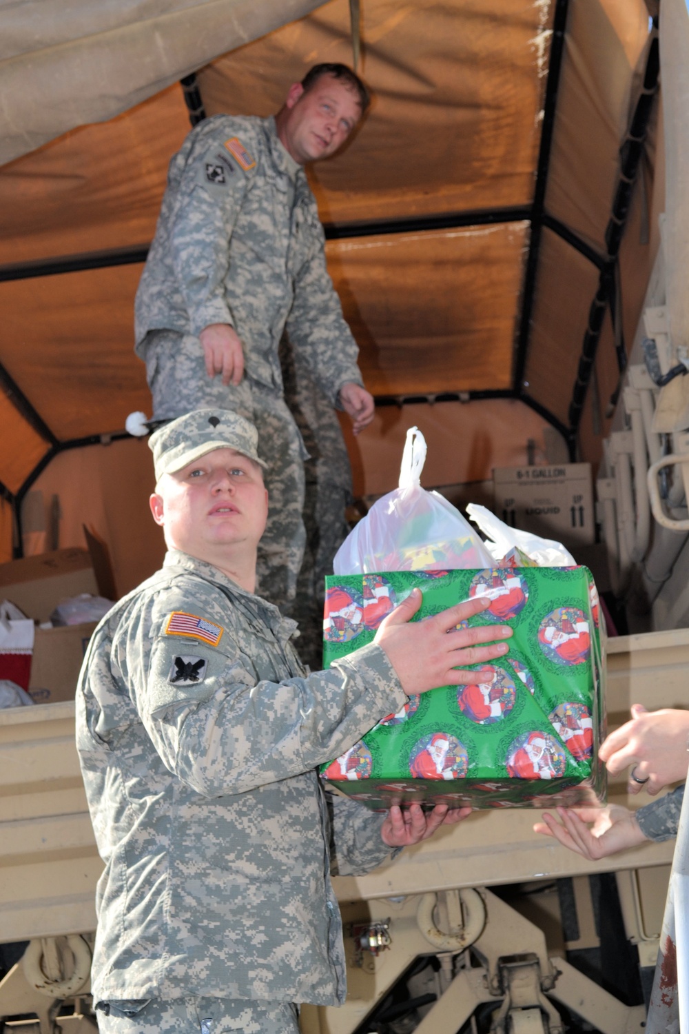 733rd Soldiers join community to fill Stockings for Soldiers