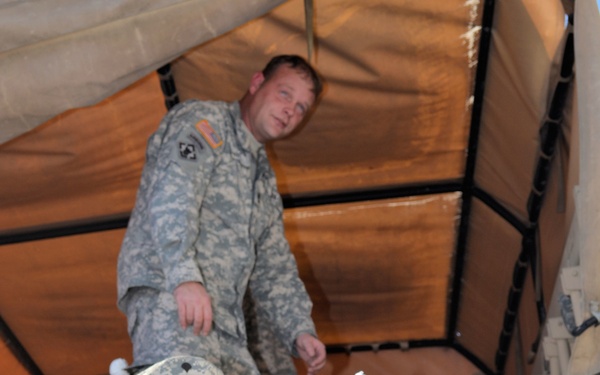 733rd Soldiers join community to fill Stockings for Soldiers