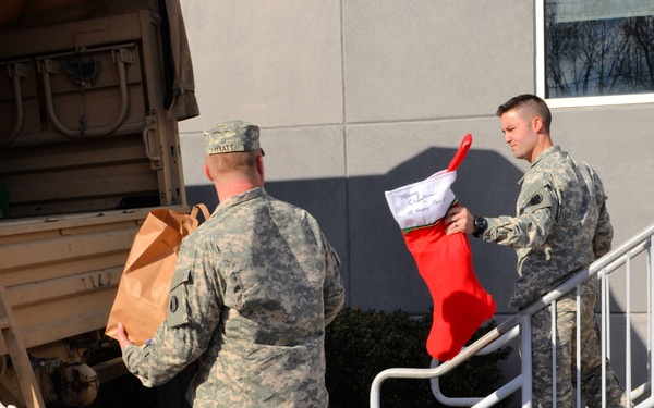 733rd Soldiers join community to fill Stockings for Soldiers
